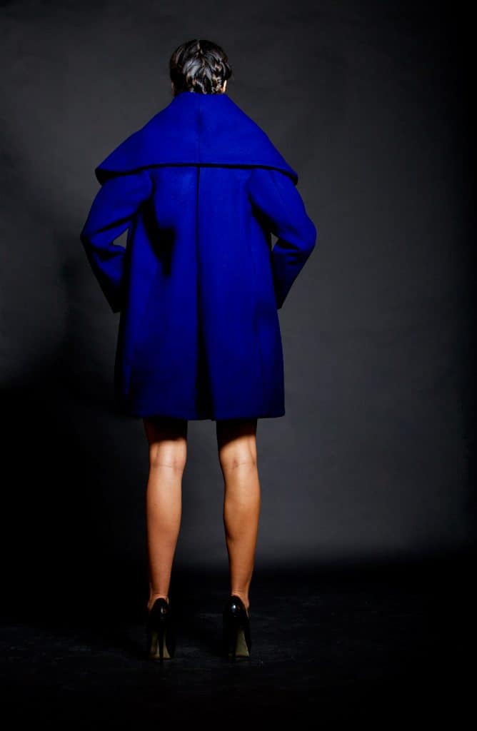 Women's RTW oversized blue coat back side