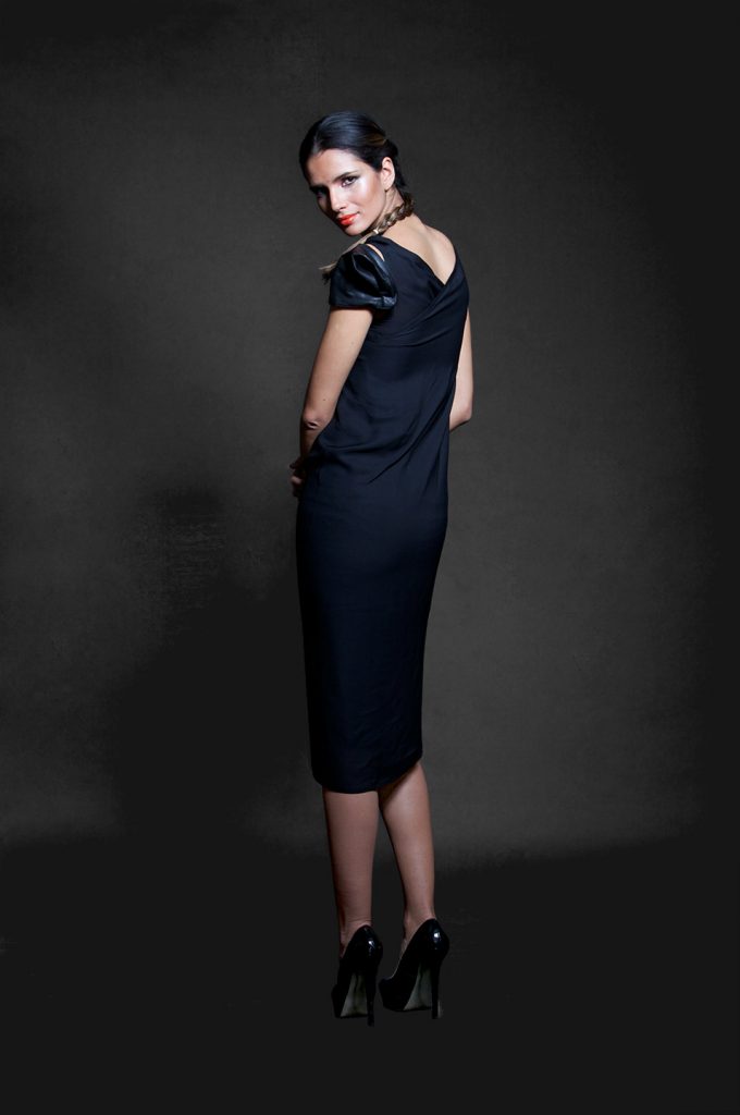 Women’s RTW black silk dress with an asymmetric shoulder detail